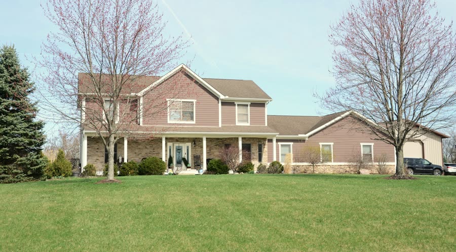 A single family home with a front lawn